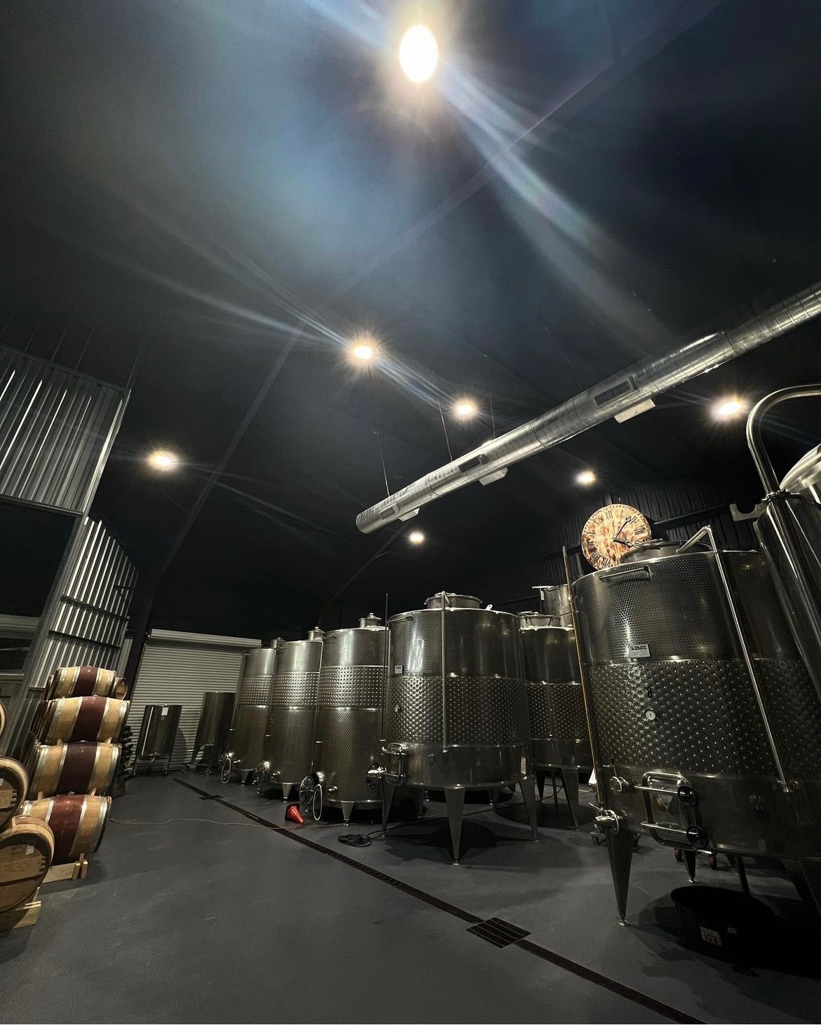 The Wine Stream cellar with tanks and oak barrels